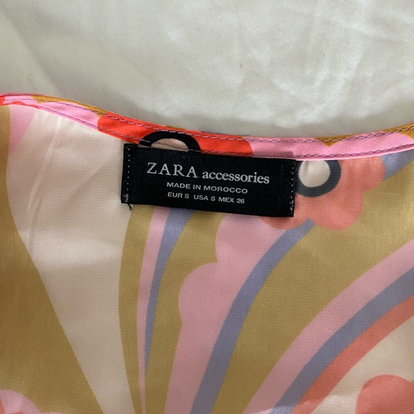Buttery material with floral print. No front closure. Purchased from Zara - Picture 3 of 3